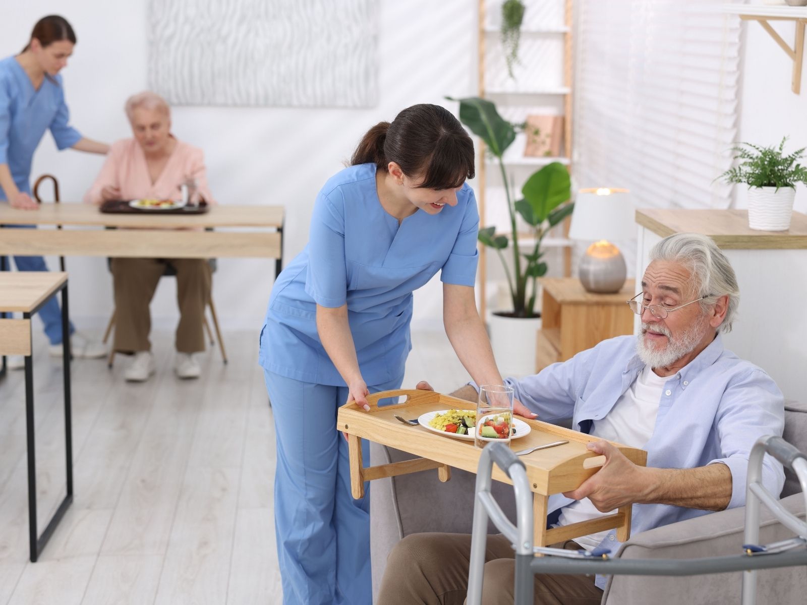 Caregiver assisting a senior with daily activities