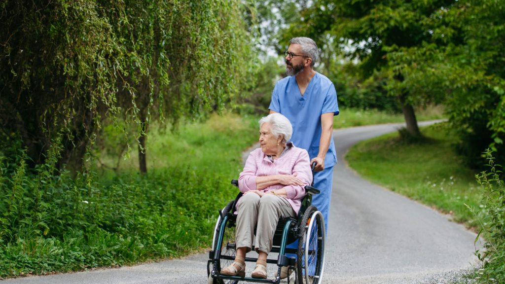 Caregiver with disabled woman