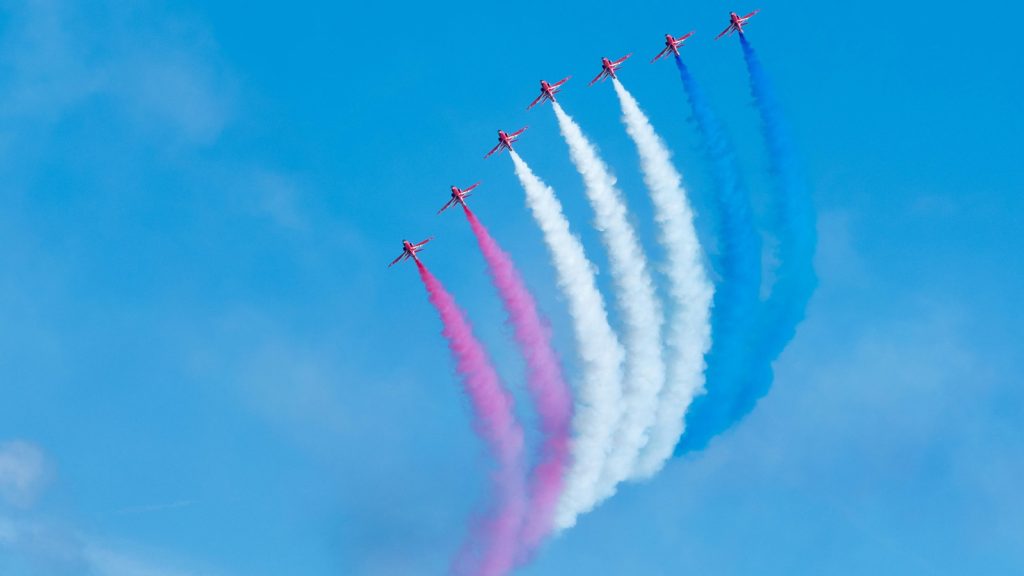 Planes with American flag trails