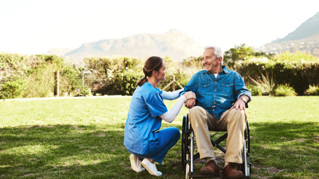 Man with caregiver