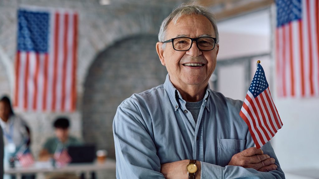 Senior holding an American flag