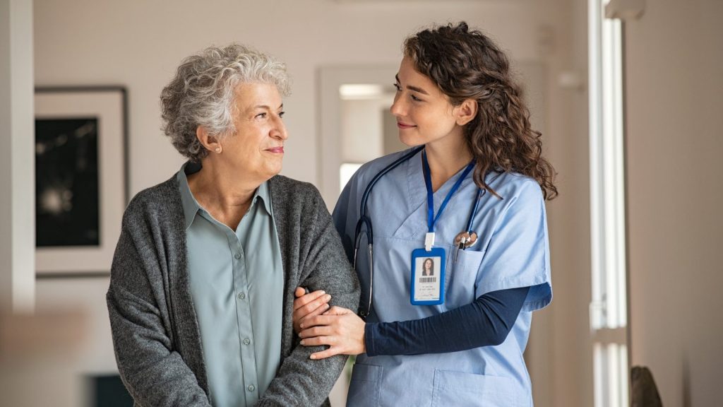 Senior woman with caregiver