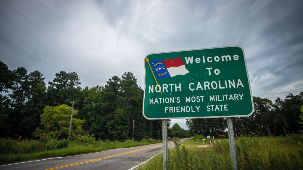 Welcome to North Carolina highway sign reading Nation's Most Military Friendly State